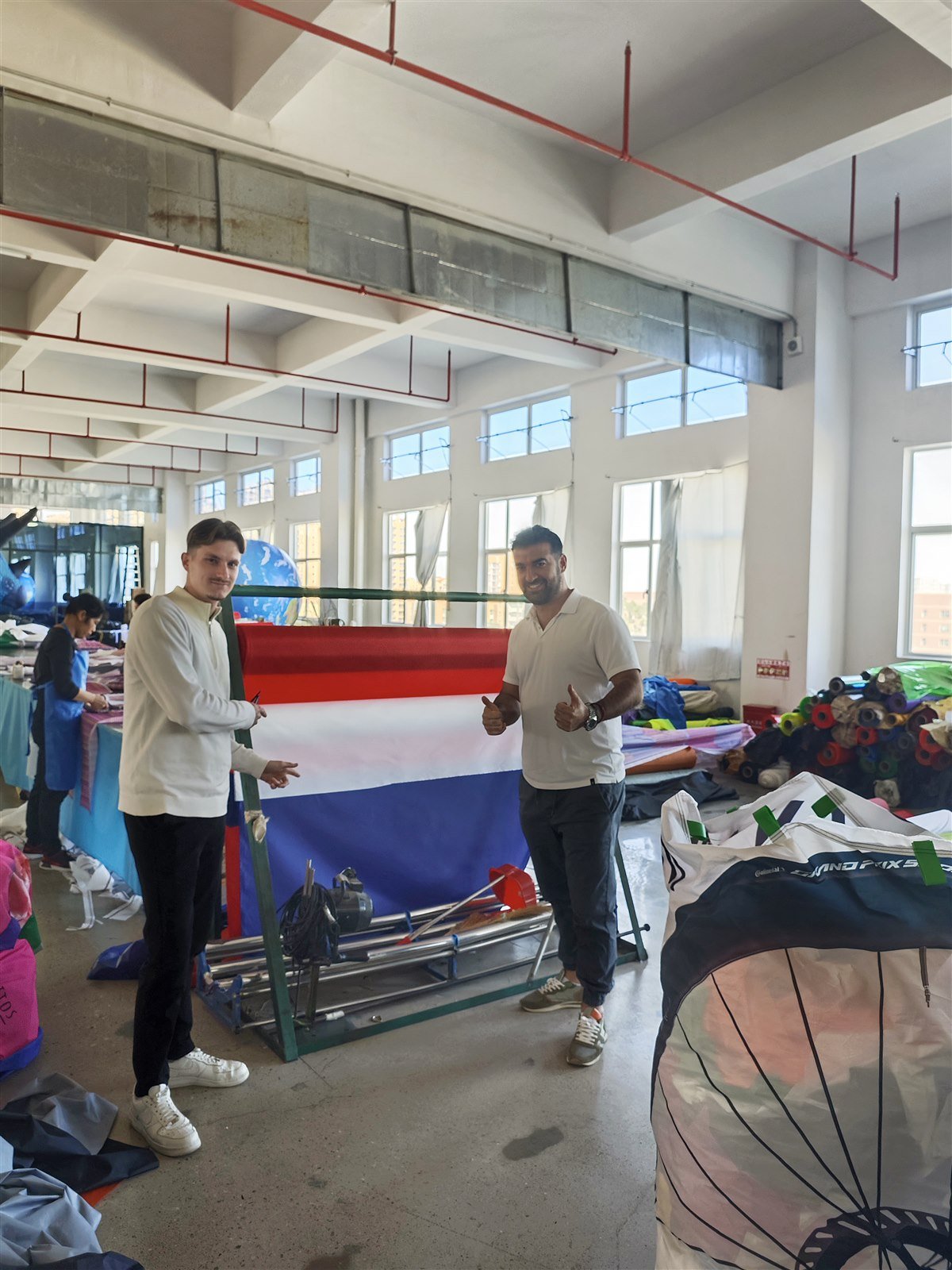Visitors reviewing inflatable maze production